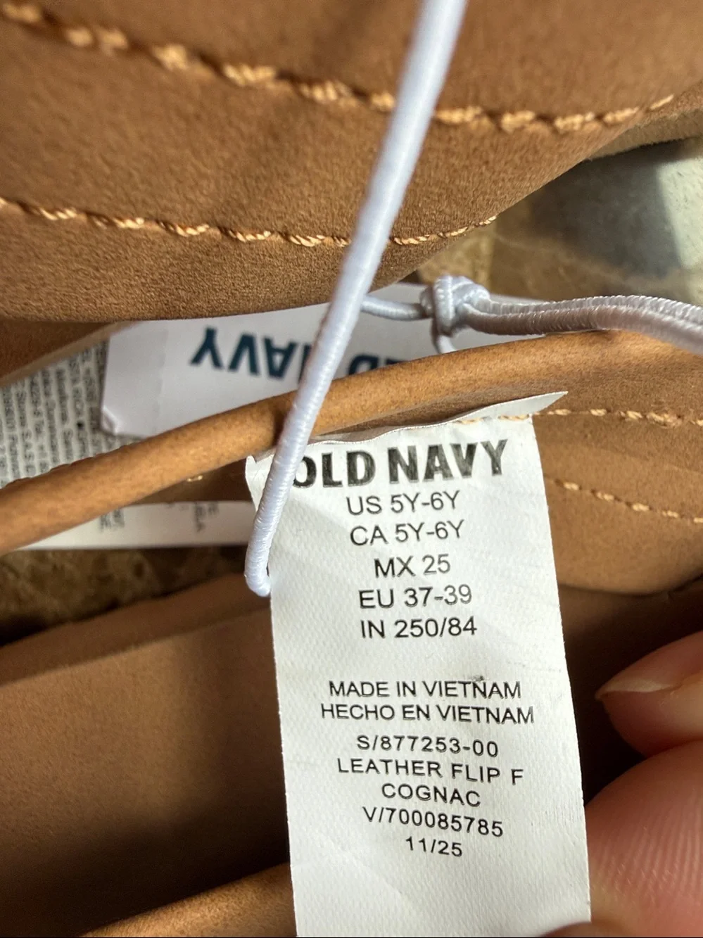 NWT. Size 5-6 big boys faux suede brown flip flops from Old Navy.